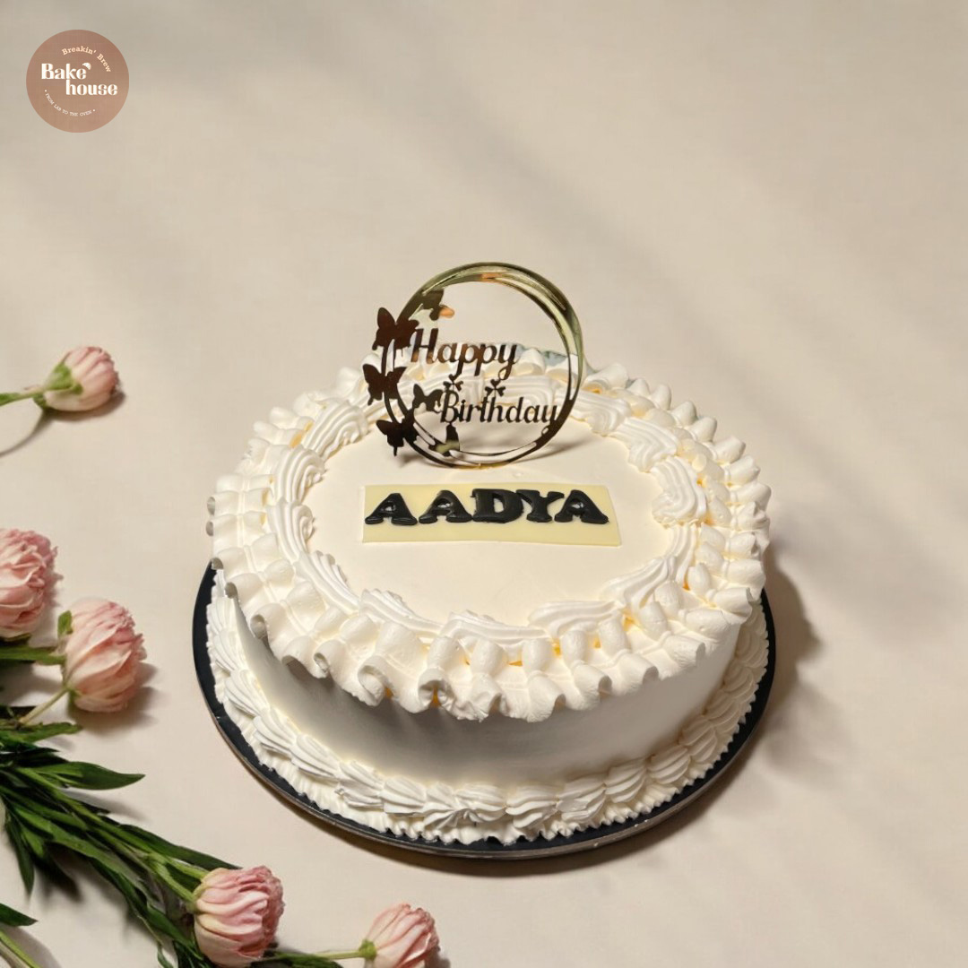 White vintage-piped celebration cake